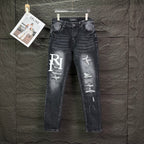 AMIRI Logo‑Print Multi‑Rip Distressed Slim‑Fit Denim Jeans
