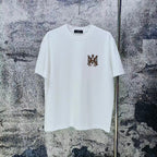 AMIRI Two‑Tone MA Monogram Chest Graphic Short‑Sleeve Tee