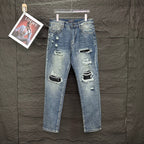 AMIRI Ripped Ribbed Patch Slim‑Fit Denim Jeans