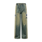 AMIRI Star‑Patch Elastic Waist Wide‑Leg Denim Pants