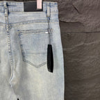 AMIRI Blue Ribbed Patch Diamond‑Rip Distressed Slim‑Fit Denim Jeans