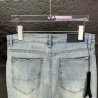 AMIRI Black Ribbed Patch Distressed Slim‑Fit Denim Jeans