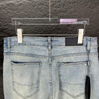 AMIRI Blue Ribbed Patch Diamond‑Rip Distressed Slim‑Fit Denim Jeans