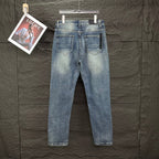 AMIRI Ripped Ribbed Patch Slim‑Fit Denim Jeans
