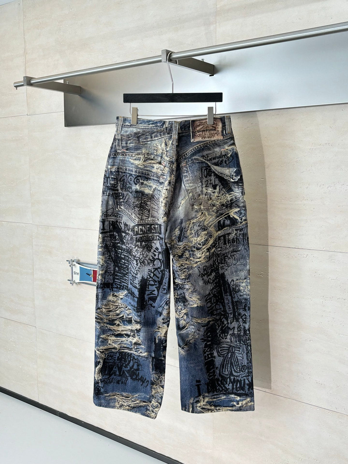 Acne Studios Graffiti‑Print Distressed Wide‑Leg Jeans