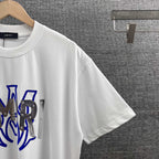 AMIRI MA Logo Riveted Letter Graphic Short‑Sleeve Tee