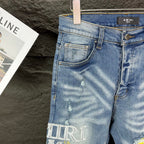 AMIRI Yellow Patch Distressed Printed Slim‑Fit Denim Jeans