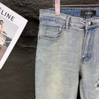 AMIRI Blue Ribbed Patch Diamond‑Rip Distressed Slim‑Fit Denim Jeans