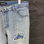 AMIRI Blue Ribbed Patch Diamond‑Rip Distressed Slim‑Fit Denim Jeans