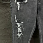 AMIRI Studded Multi‑Rip Distressed Slim‑Fit Denim Jeans