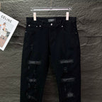AMIRI Mesh‑Lined Multi‑Rip Distressed Slim‑Fit Denim Jeans