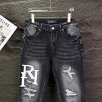 AMIRI Logo‑Print Multi‑Rip Distressed Slim‑Fit Denim Jeans