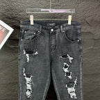 AMIRI Studded Multi‑Rip Distressed Slim‑Fit Denim Jeans