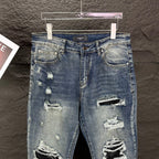 AMIRI Ripped Ribbed Patch Slim‑Fit Denim Jeans