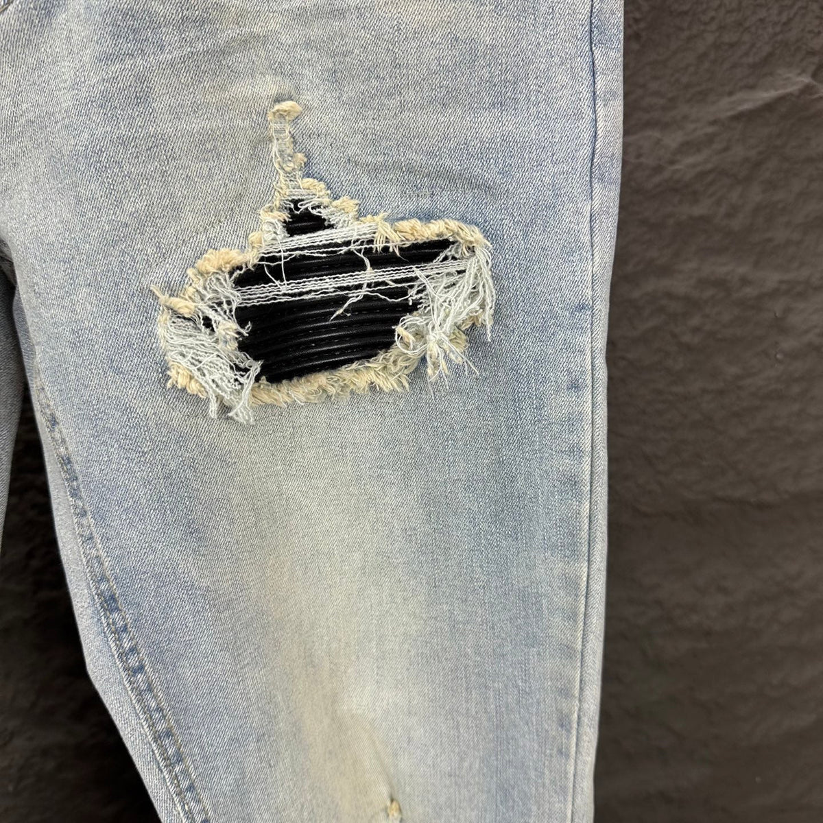 AMIRI Black Ribbed Patch Distressed Slim‑Fit Denim Jeans