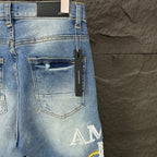 AMIRI Yellow Patch Distressed Printed Slim‑Fit Denim Jeans