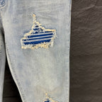 AMIRI Blue Ribbed Patch Diamond‑Rip Distressed Slim‑Fit Denim Jeans